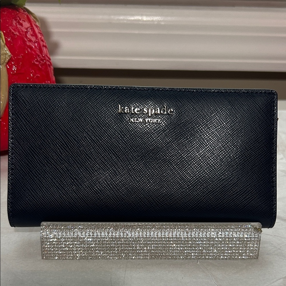 NWOT Kate Spade navy blue/ cream bifold wallet